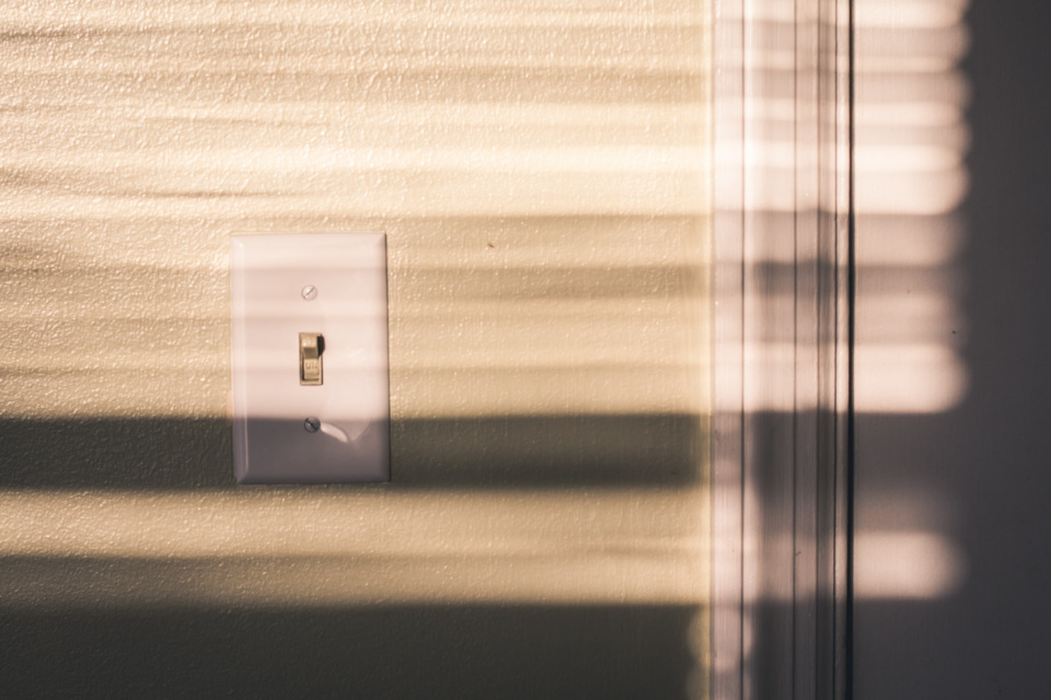 light switch with light shining on it