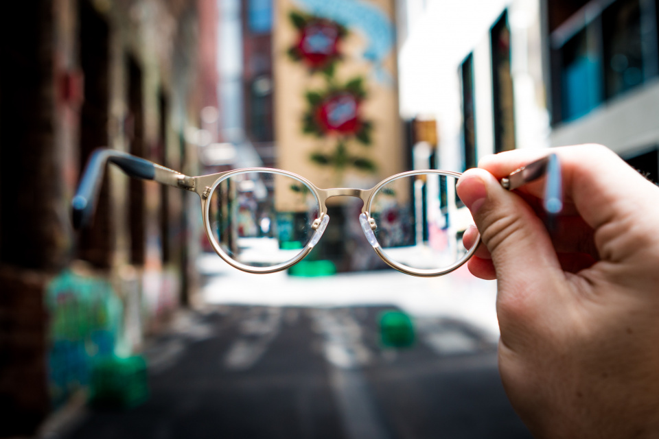 looking through glasses at a street