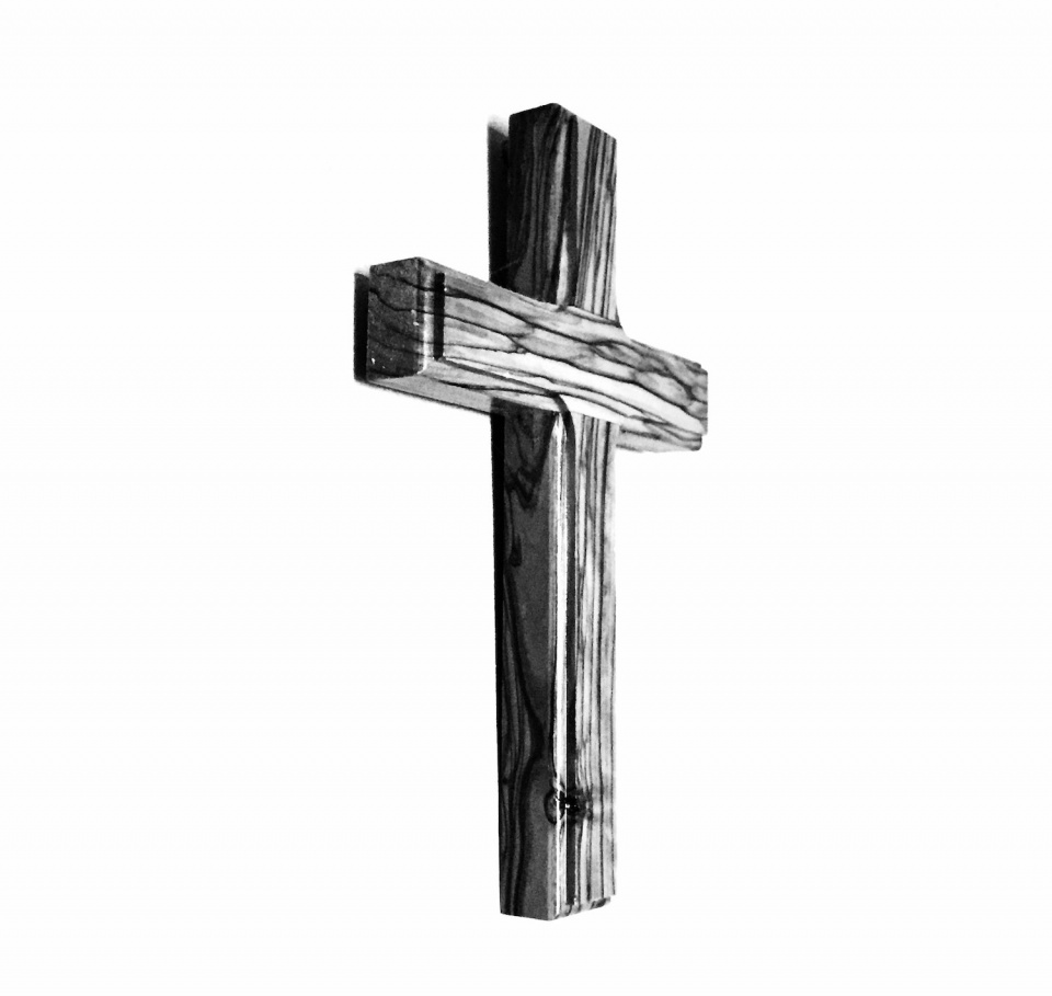 wooden cross in black and white