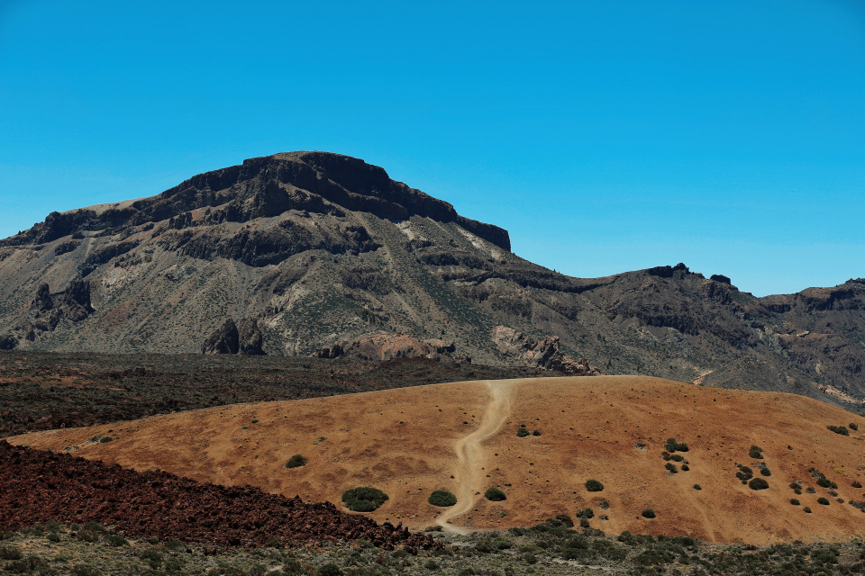 path through a desert and mountain
