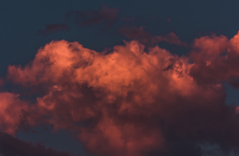 dramatic night sky that is orange and dark blue