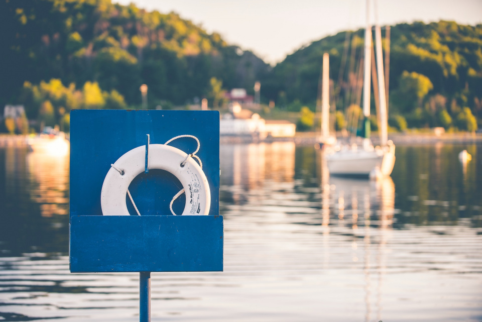 Life buoy and boats